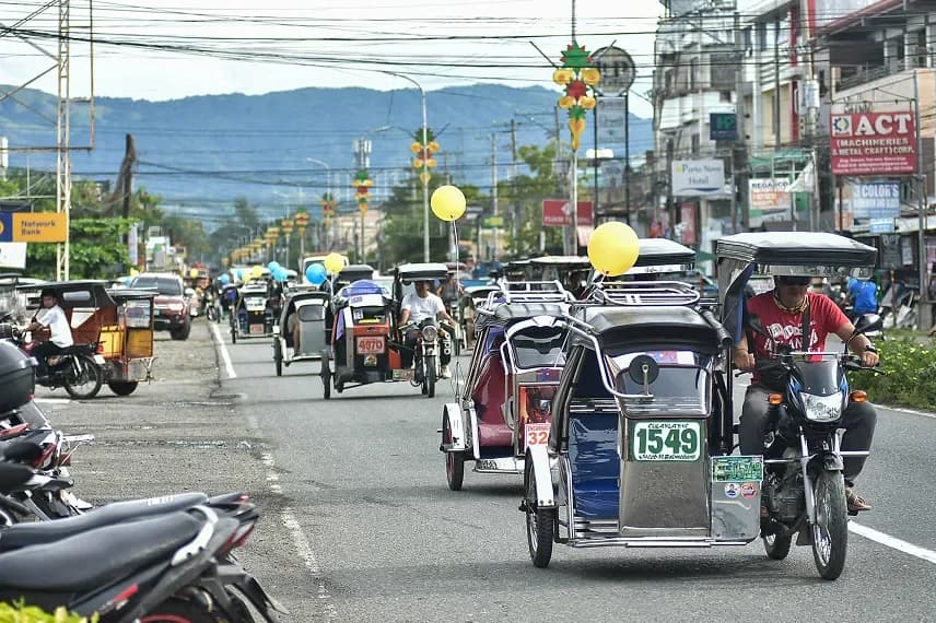 Tricycle motorcade celebrating the Pindot launch in Sta. Cruz, Laguna